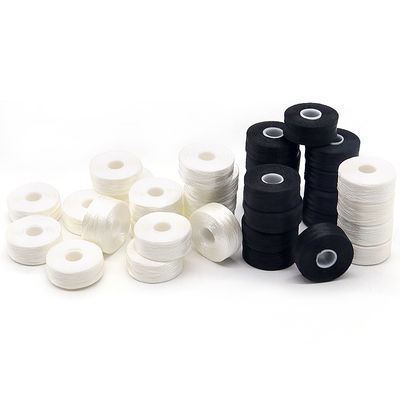 144pcs/box Pre-ferita ricamo certe cuciture bobbin colorato 75D/2 Cartone 144pcs/box