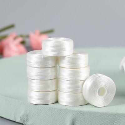 2 cm di diametro ricamo filo di fondo bianco senza confine L-tipo 75D/2 Shuttle Core cucitura prefondato bobbin 6